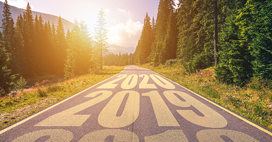 Empty asphalt road and New year 2018, 2019, 2020 concept. Driving on an empty road in the mountains to upcoming 2018, 2019, 2020 and leaving behind old years. Concept for success and passing time.